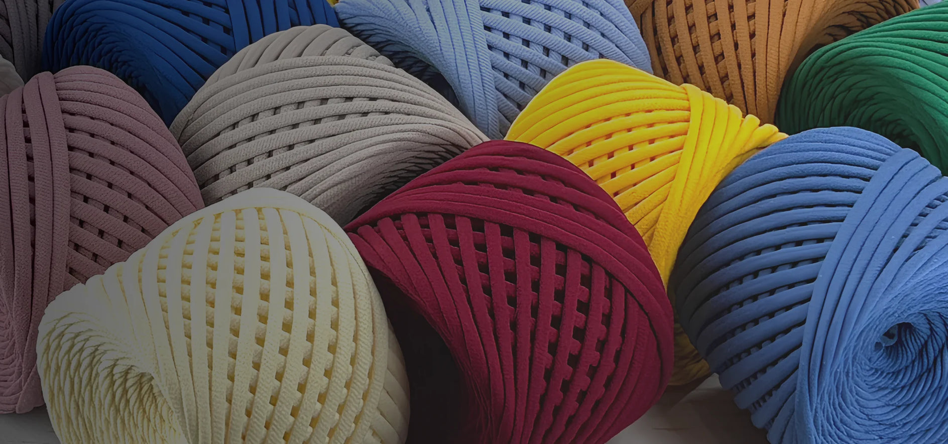 Assorted colorful yarn balls in a close-up shot