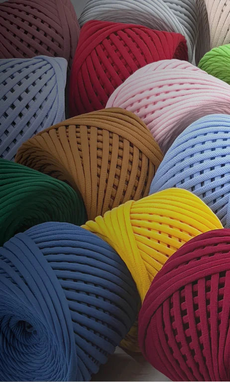 Colorful yarn balls arranged in a pattern